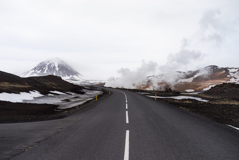 nature, symbol, landscape, adventure, beauty in nature, asphalt, gray, cold temperature, iceland, diminishing perspective, sign, distance, path, cloud - sky