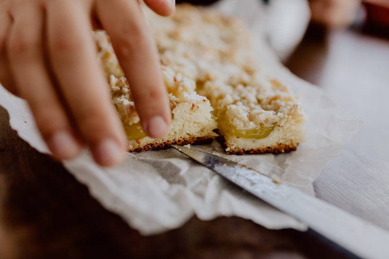 close-up, human hand, temptation, hand, indulgence, body part, food and drink, adult, dessert, plum, pie, rustic, indoors, finger, human body part, women