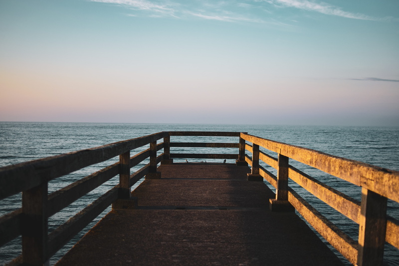 tranquility, beauty in nature, light, long, pier, bridge, port, wood - material, tranquil scene, the way forward, wood, flooring, horizon, sky, dock, outdoors