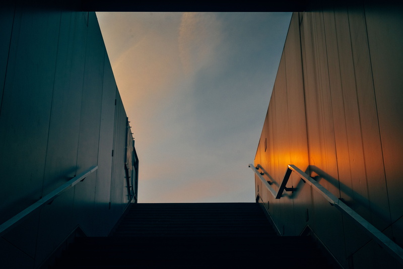 dusk, sky, sunset, display, handrail, outdoors, transportation, building, staircase, banister, the way forward, triangle, vehicle, direction, nature, boat