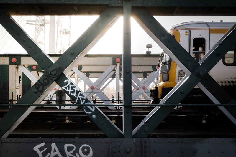 number, person, housing, day, vehicle, sign, train, terminal, outdoors, town, aircraft, skylight, transportation, handrail, built structure, no people