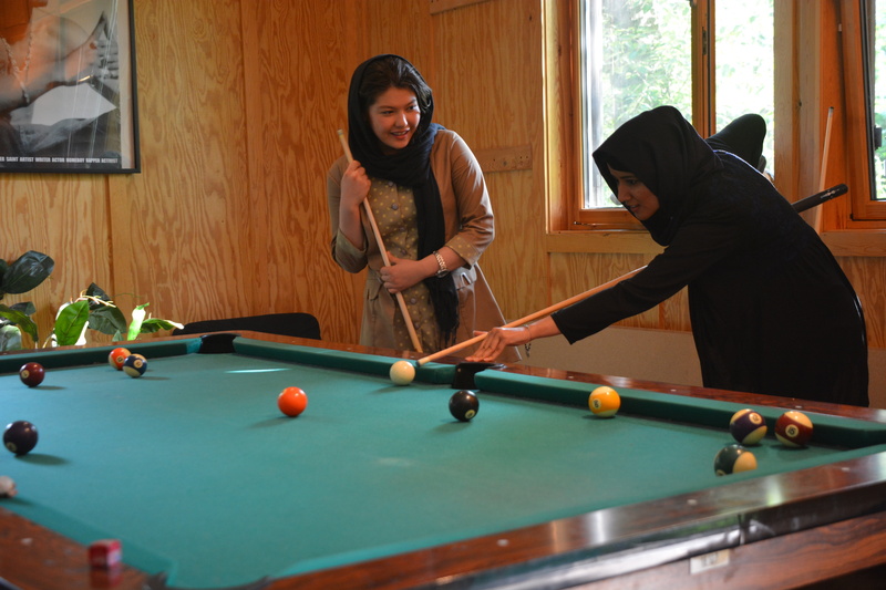 women, 5K, youth centre, laugh, young, play, fun, happy, joy, real people, pool - cue sport, afghanistan, arts culture and entertainment, billiards, bending