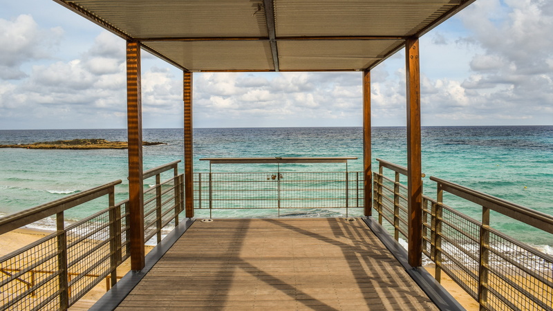 railing, water, day, horizon, sea, outdoors, fig tree bay, sky, no people, nature, beach, view, built structure, protaras, beauty in nature, tranquility