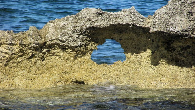 rocky coast, motion, waterfront, sunlight, natural arch, cyprus, tranquility, outdoors, no people, rock - object, solid, sea, protaras, beauty in nature