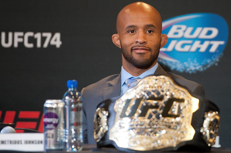 belt, young adult, glass, men, business, success, looking at camera, championship, one person, waist up, indoors, drink, adult, uSA, mma, ufc, demetrius johnson