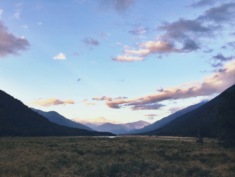 blue, no people, cloud - sky, plant, pink, landscape, grass, mountain peak, beauty in nature, green, mountain, land, sky, idyllic, road trip, mountain range