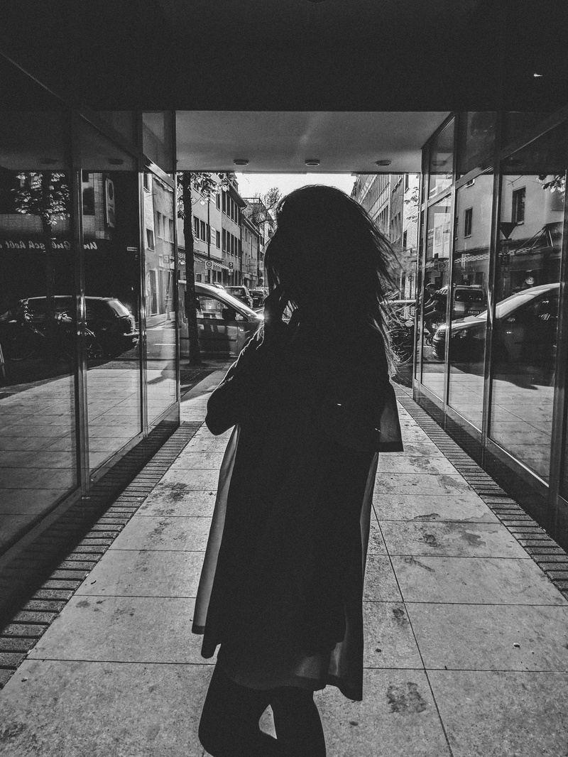 building exterior, one person, josef-schwartz-anlage 4, full length, warm clothing, urban, dusk, women, 2K, rear view, railroad station platform, street