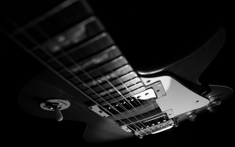 monochrome, black, technology, string instrument, telecaster, arts culture and entertainment, high angle view, music, selective focus, electric guitar