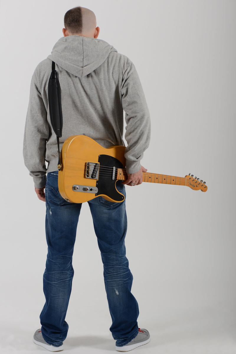 artist, musical equipment, musician, sad man, 5K, electric guitar, string instrument, musical instrument, guitar, casual clothing, full length, arts culture and entertainment