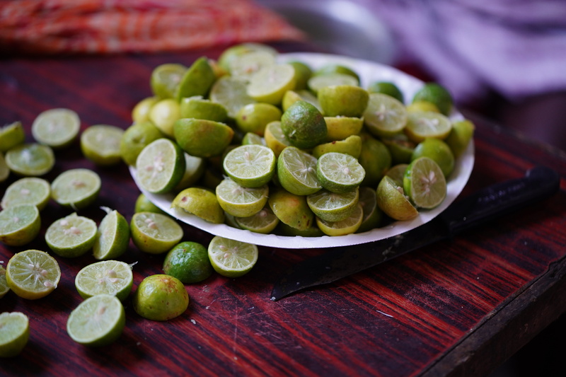 wood - material, green color, harvesting, fruit, lemon - fruit, no people, large group of objects, plate, indoors, freshness, organic, blank, nutritional supplement