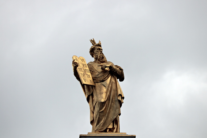 outdoors, sculpture, craft, nature, sky, religion, no people, belief, figure, female likeness, proclaim, stone tablet, book, bruges, 5K, low angle view