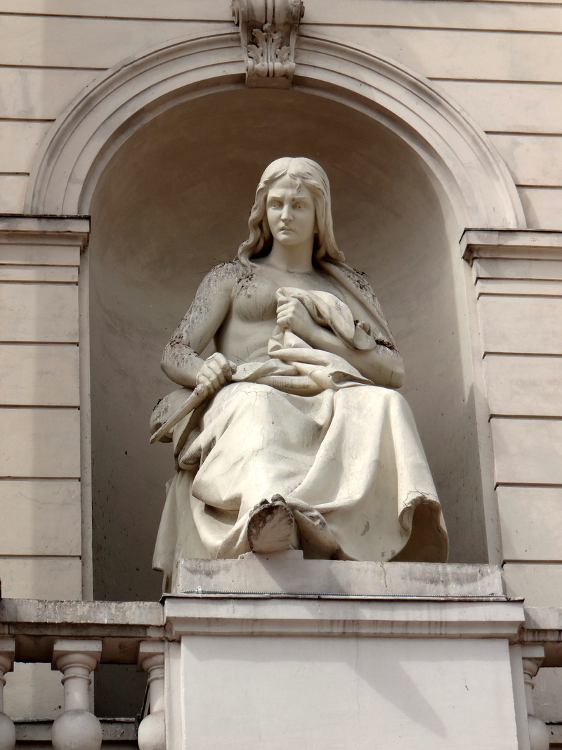 opera, place of worship, statue, human representation, built structure, female likeness, spirituality, the lviv opera house, creativity, building, an allegory