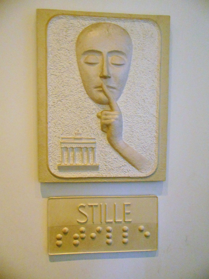 wall, art gallery, body part, craft, room of silence, creativity, metal, berlin, monuments, sign, no people, built structure, representation, western script