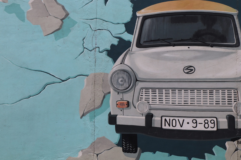day, cracks, land vehicle, satellite, structures, 1989, graffity, transportation, mode of transportation, close-up, side, blue, auto, mural, high angle view