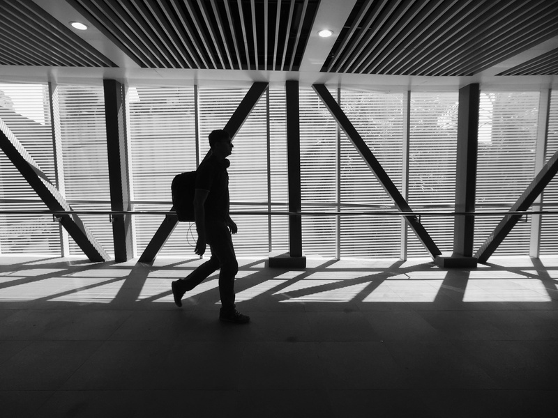 window, one person, lines, flooring, ceiling, glass - material, malaysia, kuala lumpur, man, blackandwhite, standing, bw, architecture, minimal, indoors