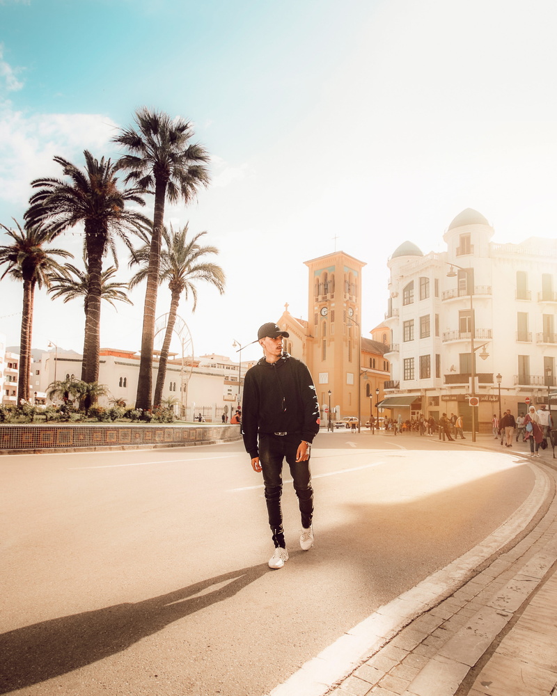 outdoorchallenge, morocco, sky, street, long, nature, lifestyles, tree, style, person, real people, shirt, sunlight, city, man, tropical climate, full length