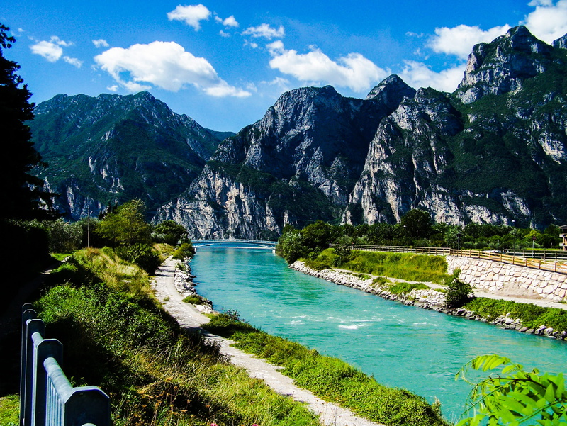 turquoise colored, valley, travel, sky, riva, tree, mountains, mountain, photo, tranquility, pathway, land, cloudy, mountain range, white, idyllic, italy