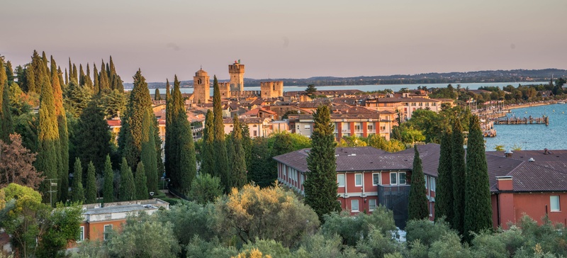 5K, lombardy, lake garda, nature, building, brown, water, plant, sky, tree, sunset, town, sirmione, city, environment, scenery, travel, tourism, buildings
