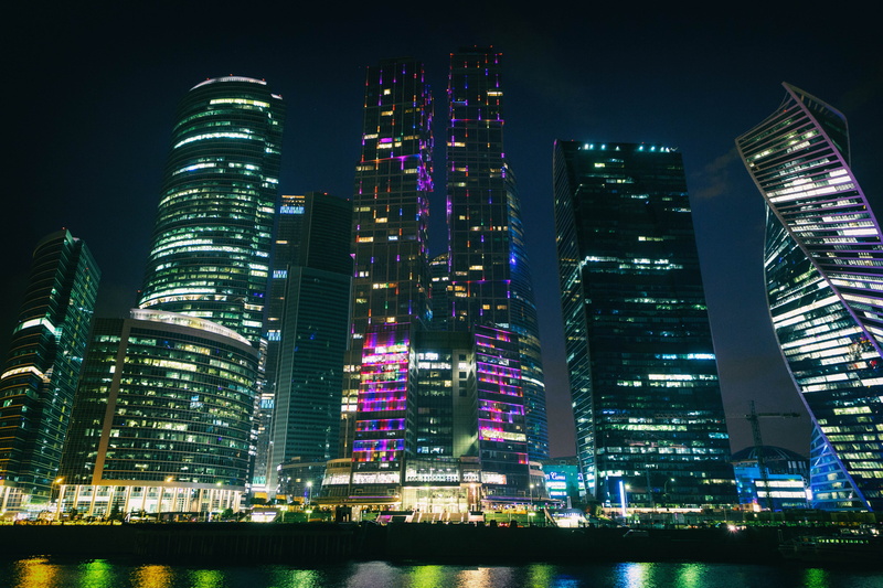 outdoors, office building exterior, russia, moscow, financial district, residential district, night, building, low angle view, sky, cityscape, no people