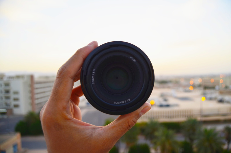 one person, technology, human body part, unsplash, cityscape, japan, photographing, lens, focus on foreground, human hand, hand, camera - photographic equipment