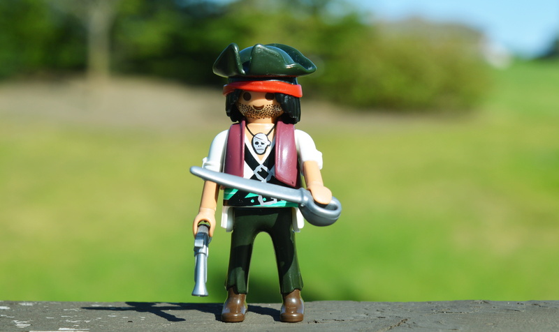 Sword, childhood, weapon, 5K, footpath, front view, male likeness, helmet, lego, one person, boy, focus on foreground, standing, Action Figure, human representation