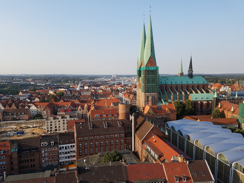 built structure, lübeck, architecture, steeple, city, city view, high angle view, clear sky, town center, crowded, religion, st marys church, building exterior