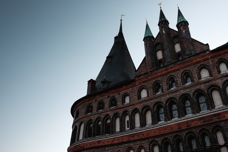 tourism, the past, holsten gate, 4K, low angle view, built structure, urban, arch, germany, brown, clock tower, fort, clear sky, travel, architecture