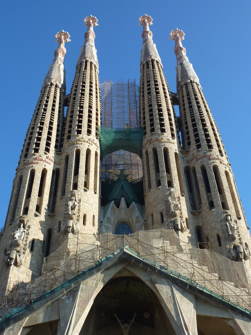 place of worship, outdoors, world heritage, religion, low angle view, sagrada família, steeple, no people, clear sky, culture, tourism, history, view, day