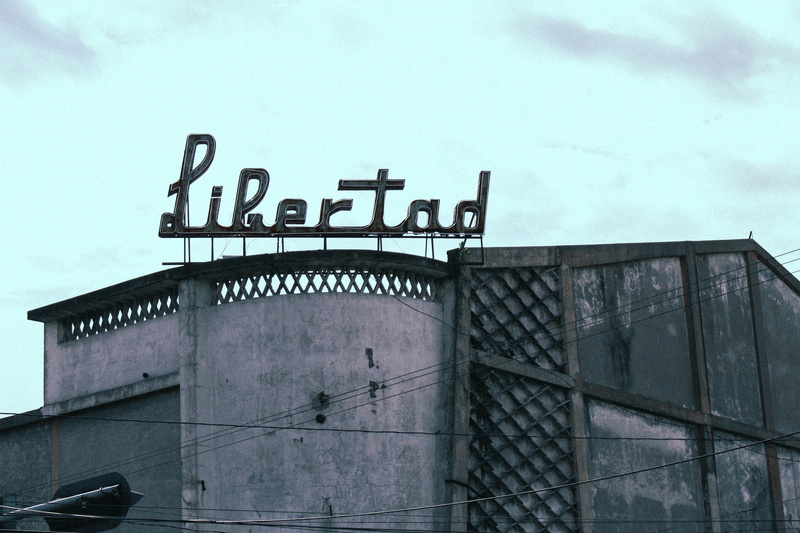 low angle view, no people, industry, architecture, western script, built structure, 5K, el salvador, outdoors, sky, capital letter, text, building exterior