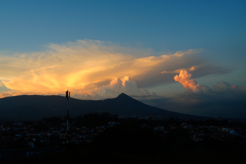 El Salvador, capital, air, sunset, tranquil scene, mountain, mountain range, nature, beauty in nature, outdoors, land, tranquility, City, orange color
