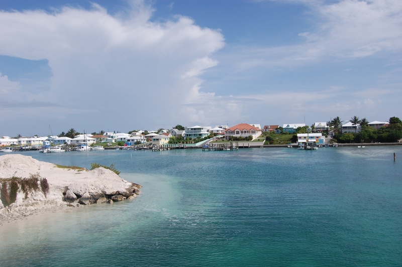 sea, tropical, beach, clouds, building exterior, residential district, cottage, outdoors, sky, spanish wells, scenic, waterfront, ocean, blue, cloud - sky