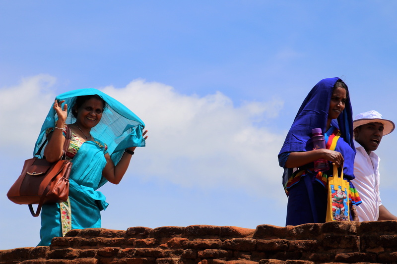 cloud - sky, child, high, adult, sari, handbag, adventure, the sun, view, headgear, girl, horizontal, nature, peace of mind, one, togetherness, colors