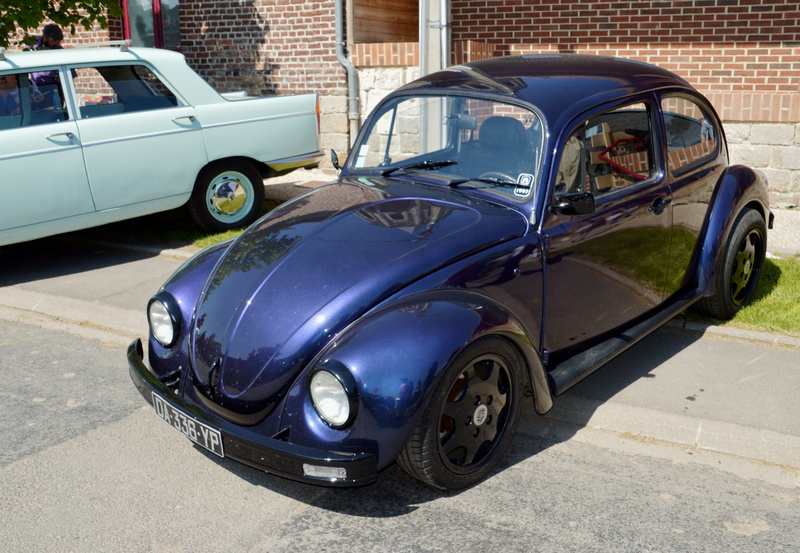 architecture, no people, street, collection, courtesy vehicle, ladybug, built structure, exhibition of old cars, car, retro, city, sunlight, luxury, gathering of old vehicles