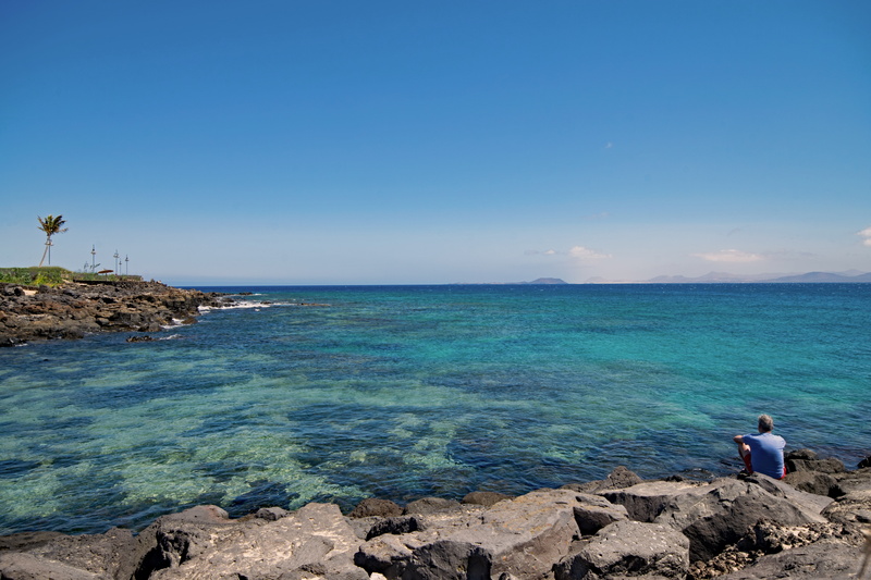 beach, nature, lanzarote, sky, solid, lonely man, one person, tranquil scene, canary islands, real people, sea, rear view, playa flamingo, leisure activity