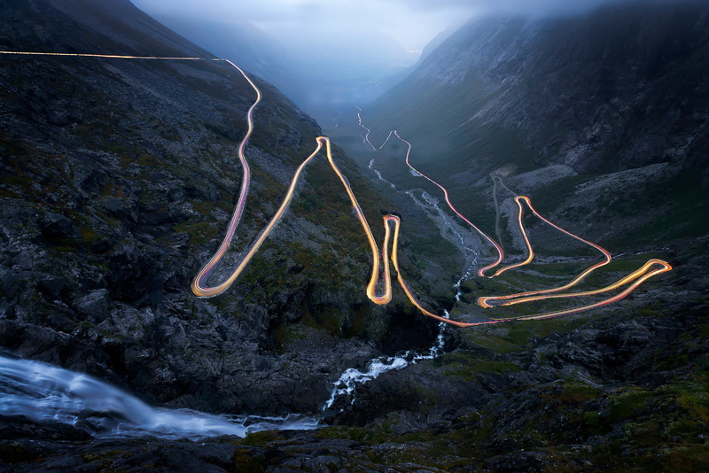 tranquil scene, winding road, water, landscape, transportation, outdoors, long exposure, 1080P, travel destinations, illuminated, mountains, non-urban scene