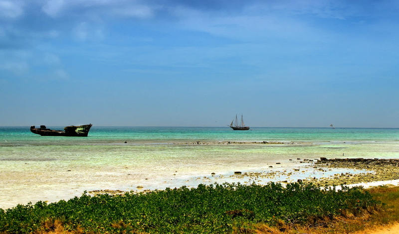 beach, sailboat, transportation, beauty in nature, travel, tranquil scene, land, aruba, shore, outdoors, maritime, nautical vessel, horizon over water