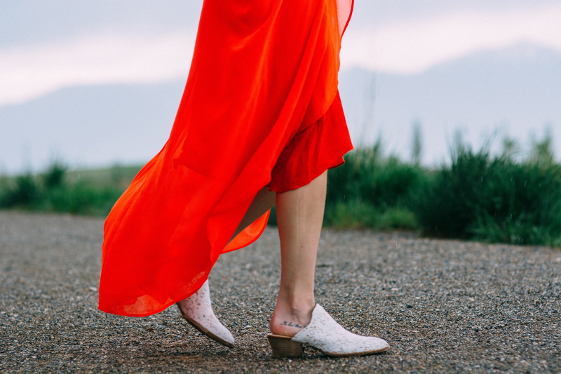 human leg, human body part, outdoor, 5K, pavement, fashion, orange, low section, travel, standing, woman, human foot, red, human limb, shoe, gray, people