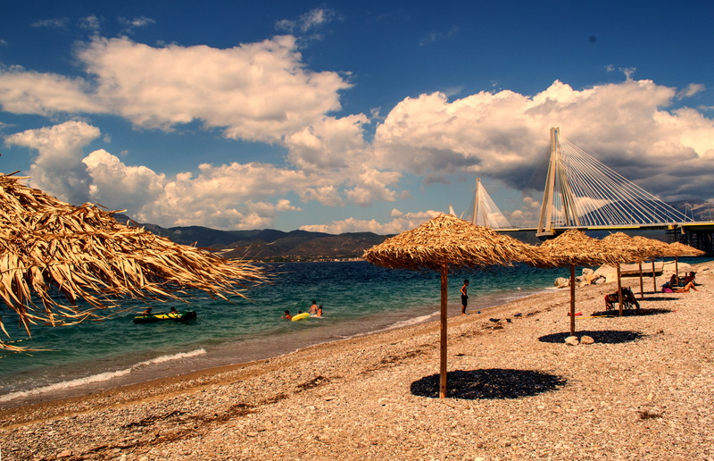 beach, sunbed, coastline, holiday, greece patra rio bridge, beautiful seascape, land, bay, green, outdoors, transportation, beauty in nature, blue, cloud - sky