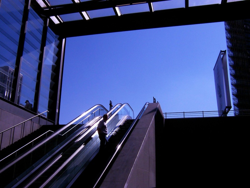 fensterm, steel, standing, building, human, blue, glass window, clear sky, man, facade, office building exterior, glass, 1080P, city, metro station, staircase