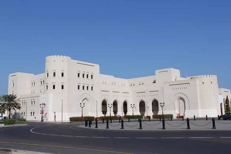 road, grand, day, incidental people, built structure, sign, muscat, historic, transportation, city, middle east, history, architectural column, tourism