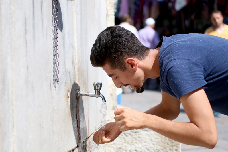 focus on foreground, the man who drank the water, wet, architecture, shiny, looking, washing, outdoors, cami, tap, one person, wudu, turkey, modern, standing