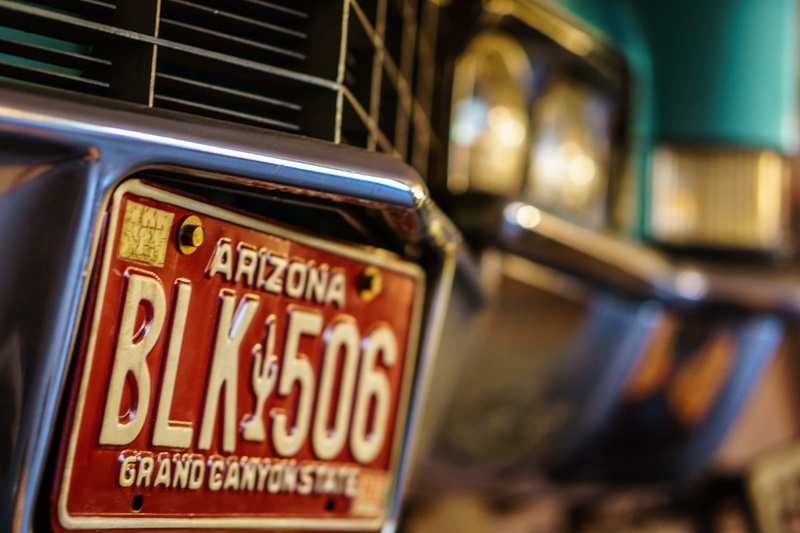indoors, retro, close-up, selective focus, text, spotlight, grille, Old, motorsport, safety, no people, western script, label, mustang, night, rarity, car