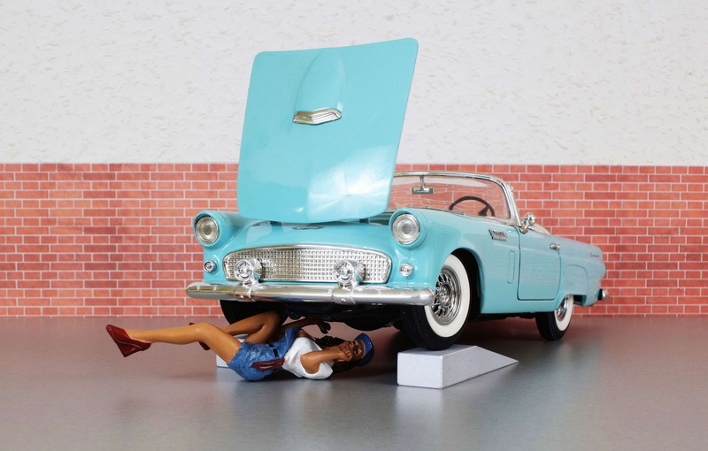 ford, automotive, wall - building feature, women, adult, childhood, indoors, oldtimer, day, model car, model, workshop, luggage, toy, shorts, old, transportation