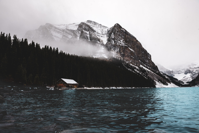 cloud, scenics - nature, cold temperature, mountain, forest, snow, travel, beauty in nature, peak, overcast, ice, canada, non-urban scene, barn, boathouse