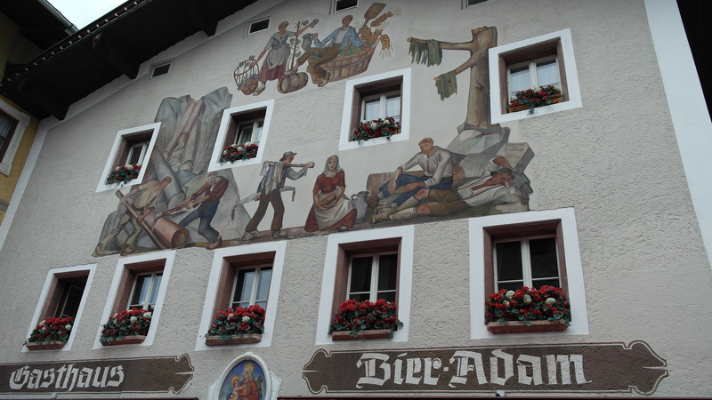 decoration, painting, facades, window, facade, sculpture, plant, representation, male likeness, wall - building feature, built structure, art form, day