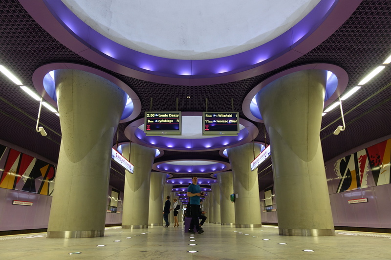 purple, flooring, incidental people, illuminated, 5K, lighting equipment, modern, poland, direction, architectural column, ceiling, tiled floor, the way forward