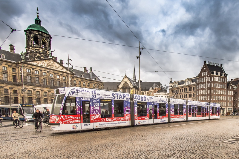 mode of transportation, urban, cityscape, europe, day, public transportation, traffic, dutch, outdoor, architecture, landmark, incidental people, bus, transport
