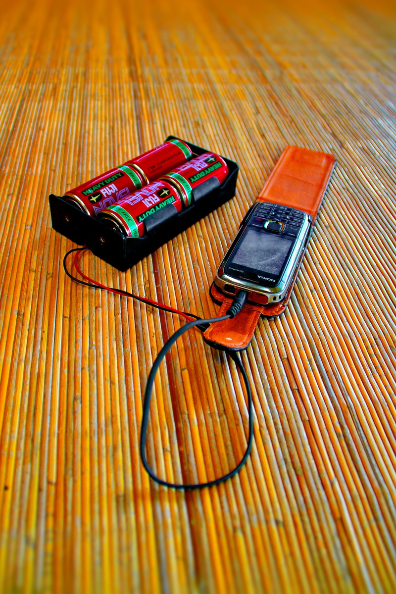 toy, sarawak, cellpohone, technology, battery, high angle view, borneo, red, power supply, bario, no people, indoors, 4K, wireless technology, table, equipment