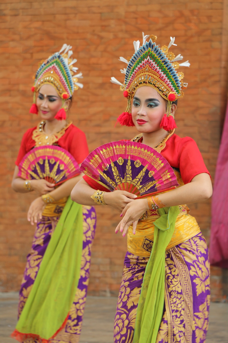 headdress, creativity, young, native, dancing, smiling, focus on foreground, portrait, bali, dancer, costume, real people, indoors, celebration, young adult