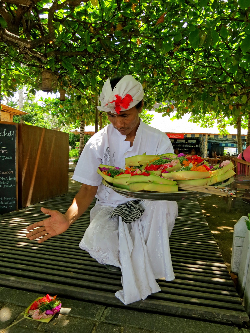 lifestyles, freshness, nature, decoration, man, indonesia, front view, standing, leisure activity, food and drink, hat, asia, day, flowering plant, balinese
